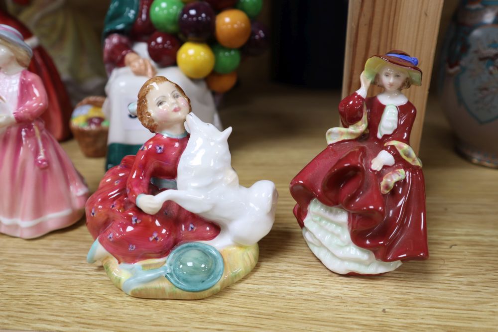 A group of Royal Albert Beatrix Potter, Royal Doulton character jugs, Royal Doulton figures, etc.